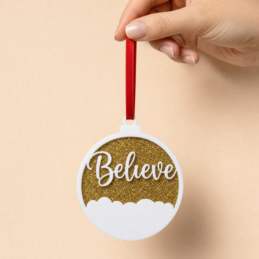 Believe acrylic bauble Christmas decoration, white script layer on gold glitter acrylic with red ribbon, KWC6218GO