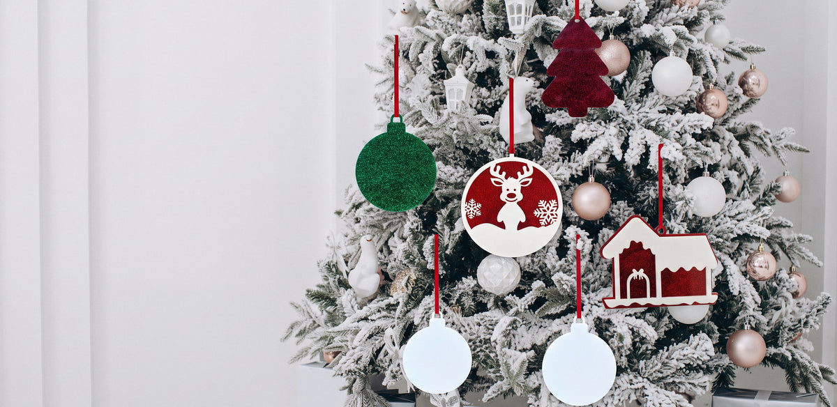 Blank acrylic Christmas decorations for sublimation hanging on a tree