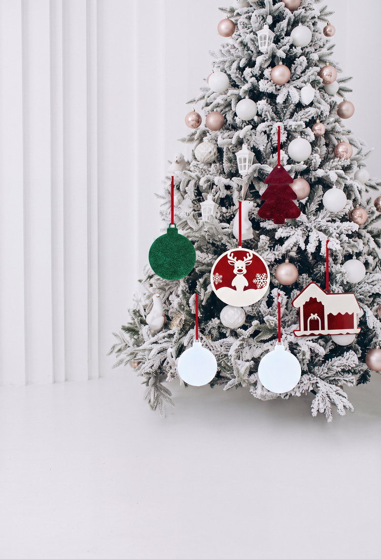 Blank acrylic Christmas decorations for sublimation hanging on a tree